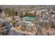 Aerial view of community amenities including tennis courts and a swimming pool at 2418 Lexington Approach Dr, Charlotte, NC 28262