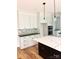 Close-up of a kitchen featuring a marble island and stainless steel appliances at 2418 Lexington Approach Dr, Charlotte, NC 28262