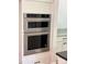 Gourmet kitchen features stainless steel KitchenAid double oven with microwave at 2418 Lexington Approach Dr, Charlotte, NC 28262
