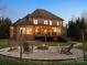 Beautiful backyard with a fire pit, hammock, and a spacious deck on the home at 2553 Cozy Cove Dr, York, SC 29745