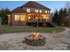 Expansive backyard with a fire pit and deck, perfect for outdoor gatherings at 2553 Cozy Cove Dr, York, SC 29745