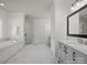 Luxurious bathroom features a soaking tub, glass-enclosed shower, and elegant fixtures at 2553 Cozy Cove Dr, York, SC 29745