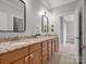 Bathroom featuring double sinks, granite countertops, and modern fixtures at 2553 Cozy Cove Dr, York, SC 29745