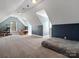 Large carpeted bonus room featuring dormer windows and a play area at 2553 Cozy Cove Dr, York, SC 29745