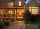 Elegant front entrance featuring a wood door with glass panels and a covered porch at 2553 Cozy Cove Dr, York, SC 29745