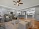 Spacious living room with hardwood floors, comfortable seating, and open layout to the kitchen at 2553 Cozy Cove Dr, York, SC 29745