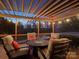 Covered outdoor patio featuring comfortable seating and a string of decorative lights at 2553 Cozy Cove Dr, York, SC 29745