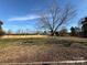 Spacious backyard featuring a fire pit and seating area at 32269 Pennington Rd, Albemarle, NC 28001