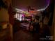 Bedroom features a bunk bed, ceiling fan, and decorative lighting at 32269 Pennington Rd, Albemarle, NC 28001