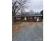 Cozy single-story brick home with driveway and well-kept landscape at 32269 Pennington Rd, Albemarle, NC 28001