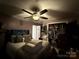 Cozy main bedroom with a ceiling fan and a closet at 32269 Pennington Rd, Albemarle, NC 28001