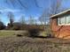 Spacious side yard showcasing the home's exterior and surroundings at 32269 Pennington Rd, Albemarle, NC 28001