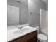 Bathroom features a large vanity sink and a white shower-tub combo at 3553 Calpella Ct, Charlotte, NC 28262