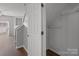Hallway leading to the living area with a coat closet at 3553 Calpella Ct, Charlotte, NC 28262