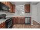 Well-lit kitchen features stainless steel appliances and plenty of cabinet space at 3553 Calpella Ct, Charlotte, NC 28262
