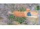 Birds eye view of the house and lot nestled among tall, mature trees in a lush forest at 3722 Thompson St, Newton, NC 28658