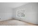 Bright bedroom featuring wood flooring, large window with natural light, and neutral wall color at 3722 Thompson St, Newton, NC 28658