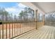 A view from the wood deck showing trees and the yard at 3722 Thompson St, Newton, NC 28658