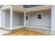 Charming front entrance with stylish columns and a covered concrete porch area at 3722 Thompson St, Newton, NC 28658