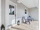 Covered front porch with cozy seating and stylish lighting, creating a welcoming entrance at 3722 Thompson St, Newton, NC 28658