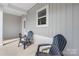 Inviting front porch with comfortable chairs, offering a relaxing outdoor space at 3722 Thompson St, Newton, NC 28658