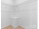 A walk-in closet with a wire shelving system and new flooring at 3722 Thompson St, Newton, NC 28658