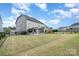 Spacious backyard featuring a gazebo, lush lawn, and a playground at 4519 Waylon Ave, Fort Mill, SC 29715