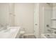 Well-lit bathroom features a single vanity, toilet, and shower-tub combo at 4919 Trigney Ct, Charlotte, NC 28214