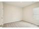 Bright bedroom features a window, new carpet, and neutral walls at 4919 Trigney Ct, Charlotte, NC 28214