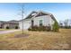 Inviting home with a manicured lawn, showcasing its attractive architecture and curb appeal at 4919 Trigney Ct, Charlotte, NC 28214