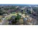 Serene aerial view of neighborhood showcasing the community layout and surrounding lush landscape in springtime at 5324 Stonewood Dr, Hickory, NC 28602