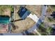 Aerial view showcasing the expansive backyard, driveway, and layout of the property within its surroundings at 5324 Stonewood Dr, Hickory, NC 28602