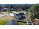 Aerial view of a home featuring a deck, patio furniture, fenced yard, and mature trees at 5324 Stonewood Dr, Hickory, NC 28602
