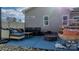 Inviting backyard patio with comfortable seating, hot tub, and a charming fire pit ideal for gatherings at 5324 Stonewood Dr, Hickory, NC 28602