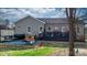 Relaxing backyard with a hot tub, outdoor seating, and a stylish egg chair, perfect for entertaining at 5324 Stonewood Dr, Hickory, NC 28602