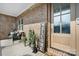 Inviting front porch with chairs, plants and a Welcome sign at 5324 Stonewood Dr, Hickory, NC 28602