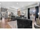 Spacious and open living room with a comfortable sofa, hardwood floors, and stylish decor at 5324 Stonewood Dr, Hickory, NC 28602