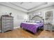Main bedroom with hardwood floors, neutral walls, and decorative accents at 5324 Stonewood Dr, Hickory, NC 28602