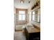 Bathroom featuring tiled shower with glass door, granite countertop, and ample lighting at 55 Academy Nw Ave, Concord, NC 28025