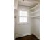 Walk-in closet with built-in shelving, wooden floor and hanging space at 55 Academy Nw Ave, Concord, NC 28025