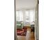 Bright living room area with hardwood floors, seating, and natural light at 55 Academy Nw Ave, Concord, NC 28025