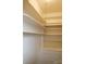 Built-in storage with open shelving provides room to store many items at 55 Academy Nw Ave, Concord, NC 28025
