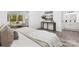 Serene bedroom with large windows, soft lighting, and tastefully decorated with comfortable furnishings at 608 Picketts Cir, Indian Trail, NC 28079