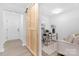 Bright home office featuring modern decor, neutral color palette, and barn door entrance at 608 Picketts Cir, Indian Trail, NC 28079