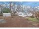 Spacious backyard featuring a shed, some trees, and a partial fence at 63 3Rd Nw St, Concord, NC 28027