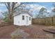 Storage shed on a home's property with a privacy fence and new paint at 63 3Rd Nw St, Concord, NC 28027