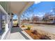 Inviting view from the covered porch, showcasing the landscape and neighborhood street at 709 N York St, Gastonia, NC 28052