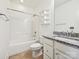 Clean bathroom with granite countertop vanity and shower-tub combination at 817 Digby Rd, Rock Hill, SC 29730