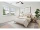 Virtual staging of a bedroom featuring neutral tones and ample natural light at 817 Digby Rd, Rock Hill, SC 29730