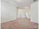 Empty room featuring neutral carpet and overhead lighting at 817 Digby Rd, Rock Hill, SC 29730